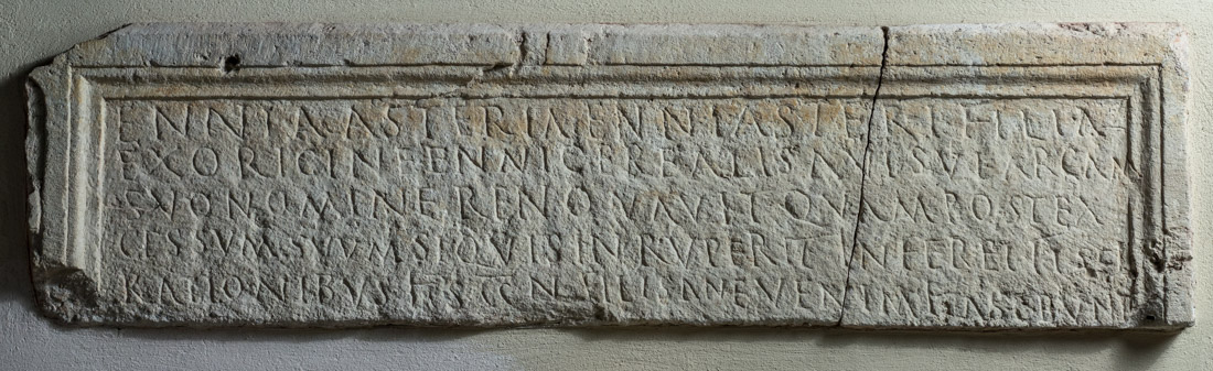 Limestone sarcophagus with inscribed front.
