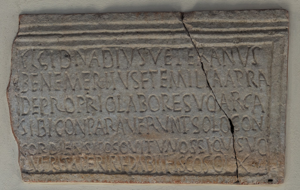 Inscribed panel of a limestone sarcophagus