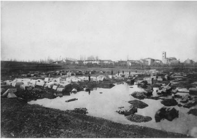 Black and white picture of the Eastern Necropolis of Concordia, with its sarcophagi emerging from the water